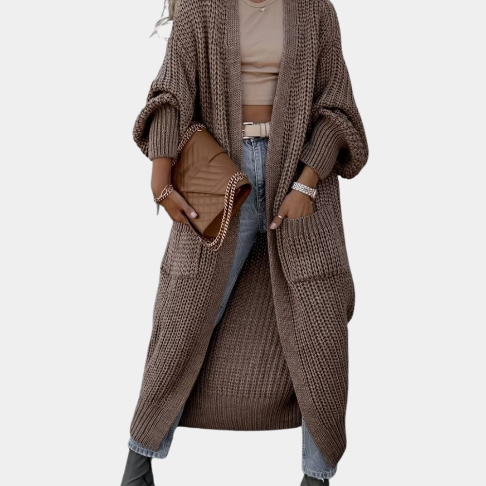 Stylisches, langes Damenstrickjäckchen von Manette