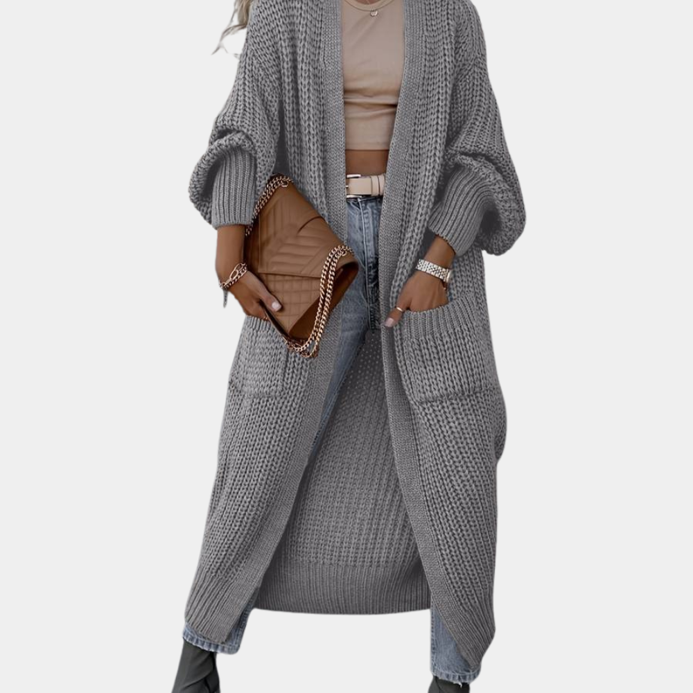 Stylisches, langes Damenstrickjäckchen von Manette